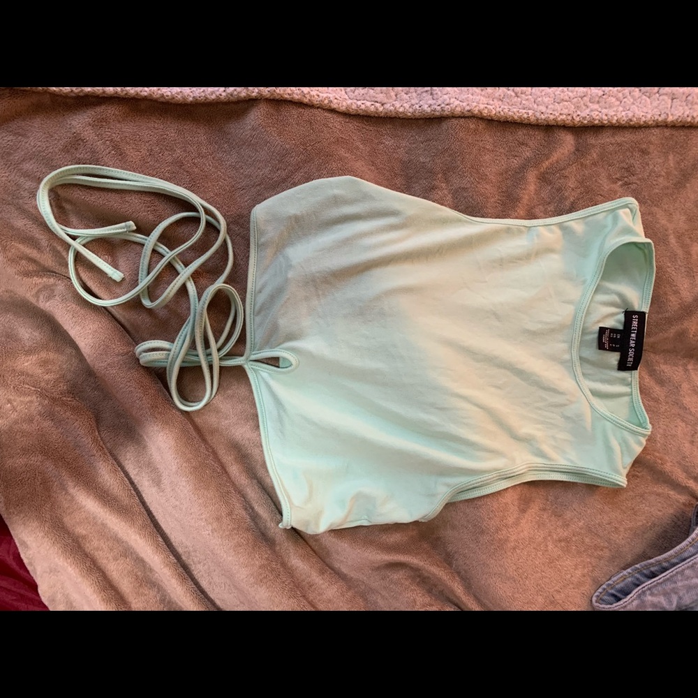 Green tie waist crop top.